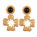 Eckhard Cross Shaped Stud Earrings