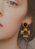 Eckhard Cross Shaped Stud Earrings