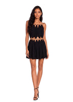 Wally Sleeveless Metal Ring Mini Dress In Black